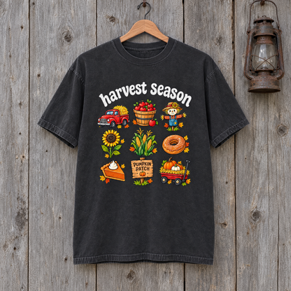 Harvest Season fall Comfort Colors shirt in Black on a wooden hanger