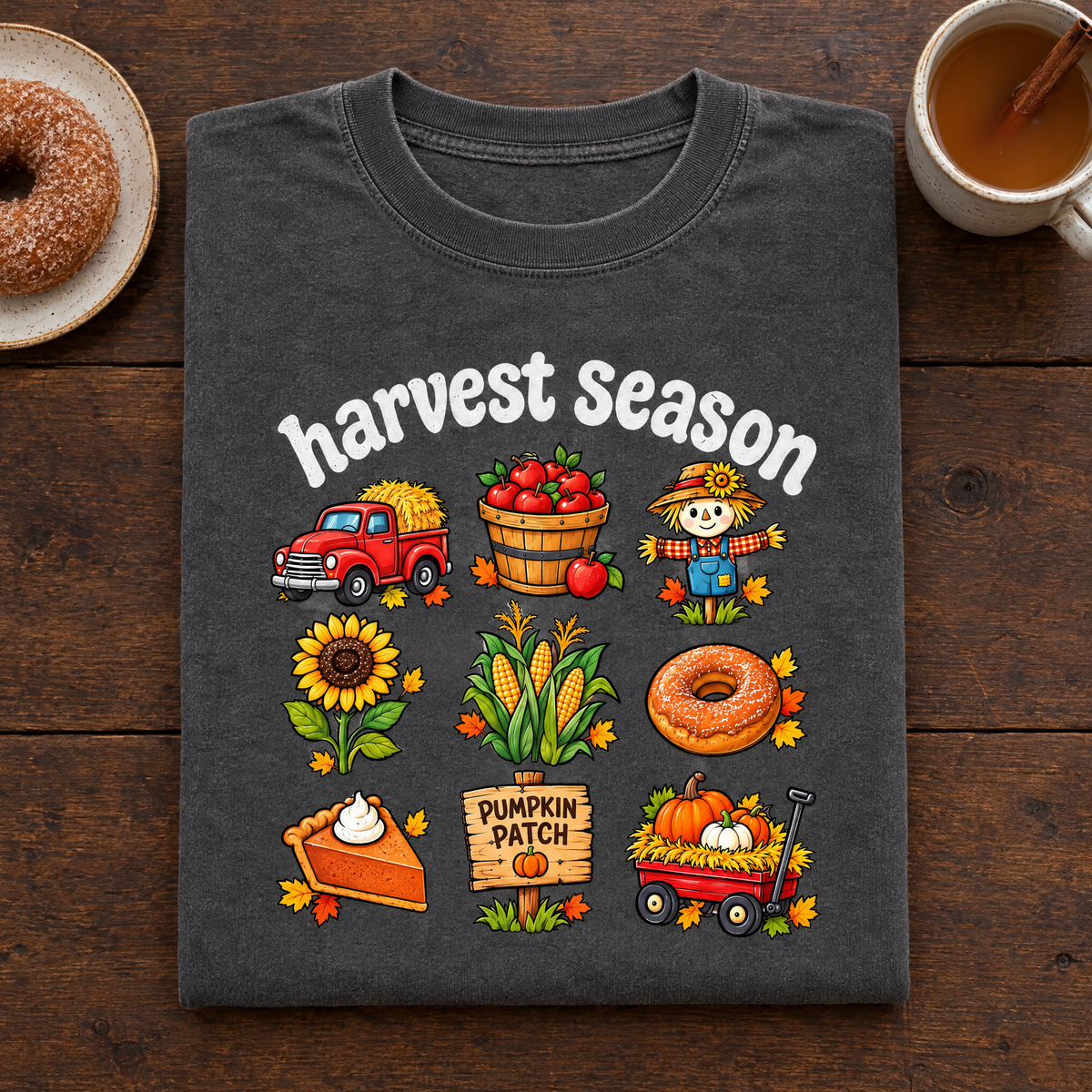 Fall farm Harvest Season tee in Pepper, folded with a cider donut and apple cider