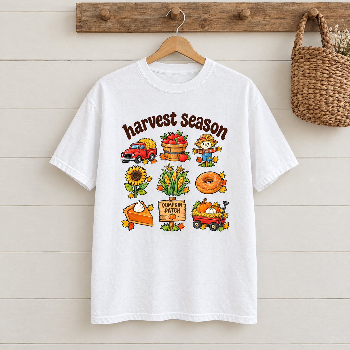 Harvest Season fall Comfort Colors shirt in White on a wooden hanger