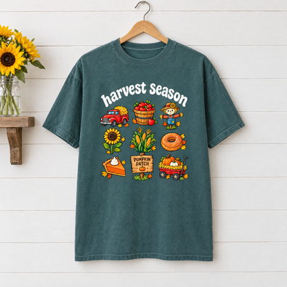 Harvest Season Comfort Colors shirt in Blue Spruce on a wooden hanger