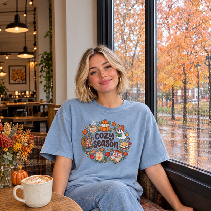Woman wearing Chambray Comfort Colors Cozy Season shirt in a cafe on a rainy fall day