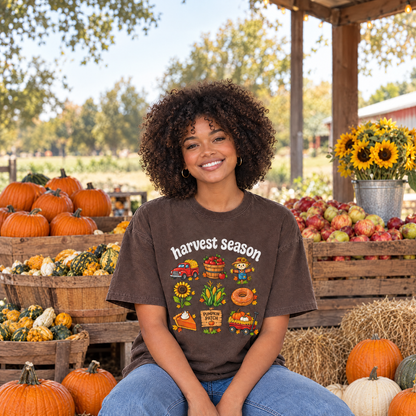 Woman wearing Espresso Comfort Colors Harvest Season shirt at a farmers market pumpkin stand