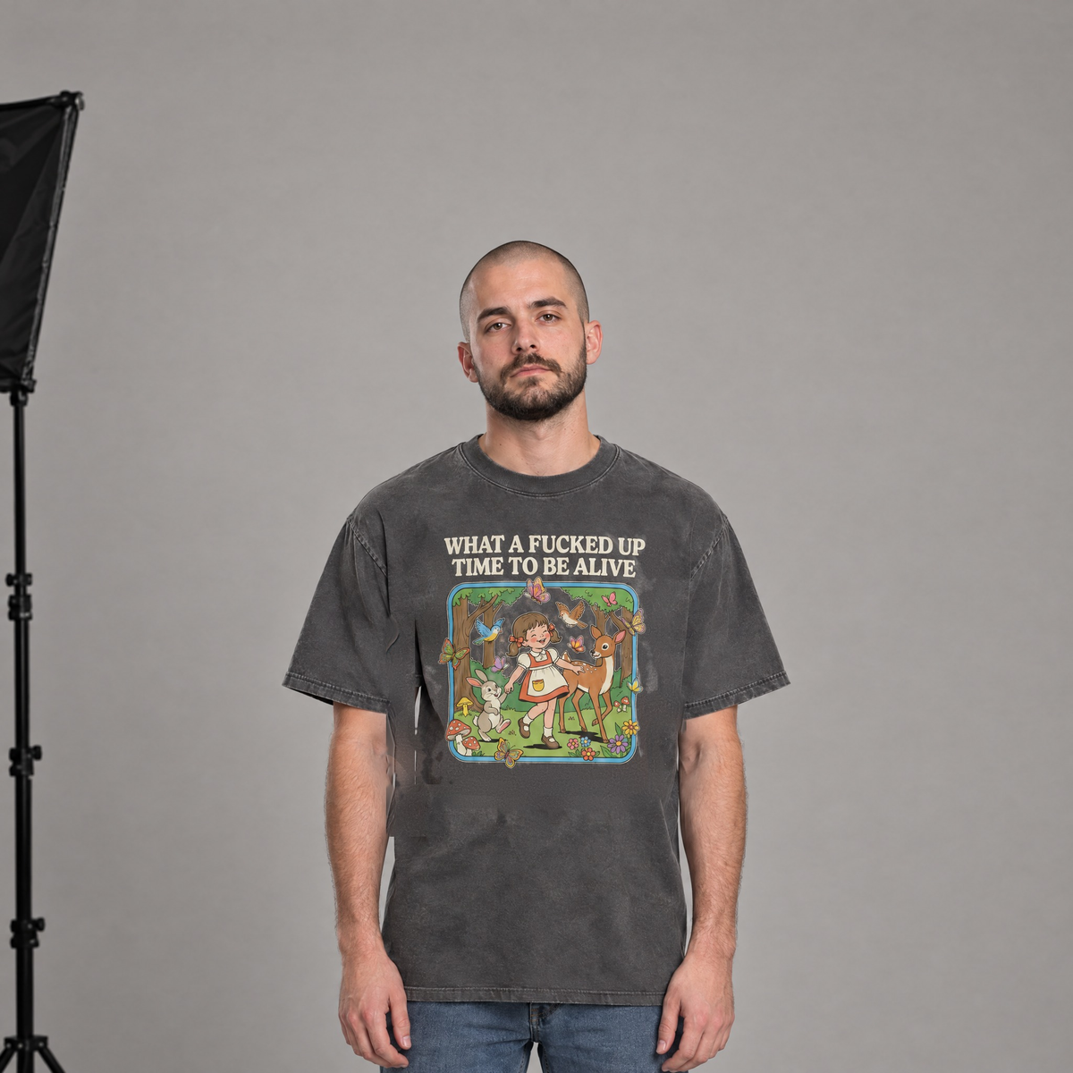 Man wearing Pepper Comfort Colors What a Time to Be Alive shirt in a photo studio