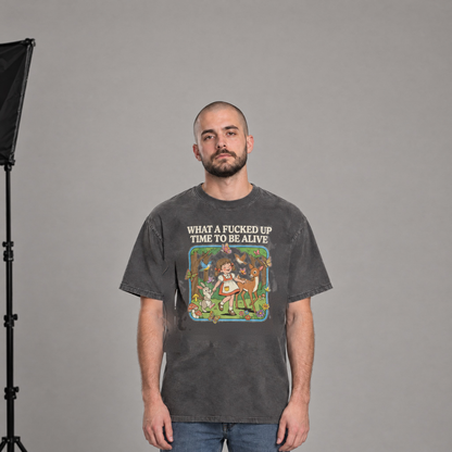 Man wearing Pepper Comfort Colors What a Time to Be Alive shirt in a photo studio