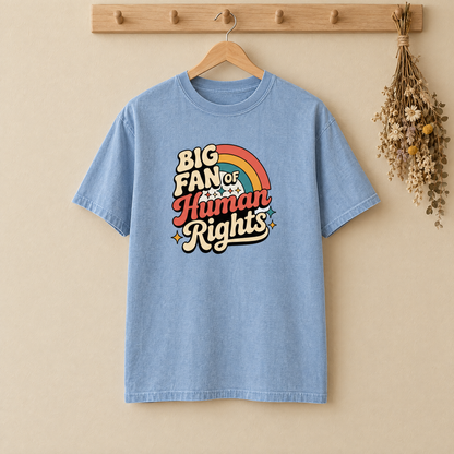 Big Fan of Human Rights Comfort Colors shirt in Chambray on a wooden hanger