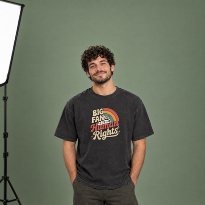 Man wearing Black Comfort Colors Big Fan of Human Rights shirt in a photo studio