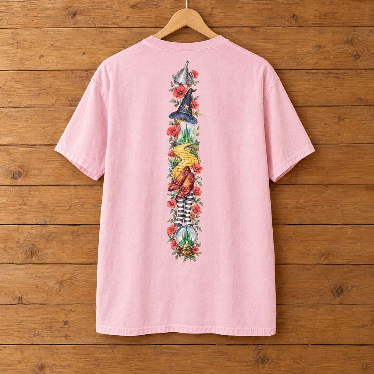 Back print of the Las Vegas Comfort Colors shirt in Blossom pink on a wooden hanger