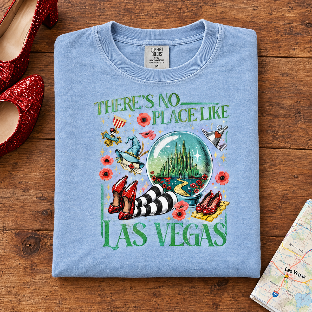 Las Vegas trip tee in Chambray, folded with red glitter shoes and a road trip map