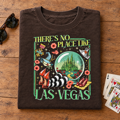 Las Vegas emerald city tee in Espresso, folded with sunglasses and playing cards