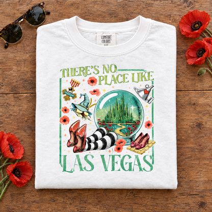 Las Vegas emerald city tee in White, folded with sunglasses and red poppies
