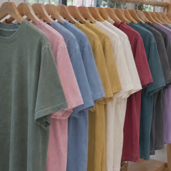 Second Breakfast Club Comfort Colors shirt video: color rack and try-on by a woman and a man