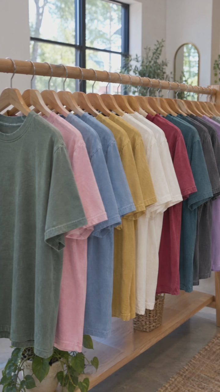 Second Breakfast Club Comfort Colors shirt video: color rack and try-on by a woman and a man