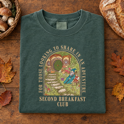 Second Breakfast Club cottagecore tee in Blue Spruce, folded with mushrooms and rustic bread