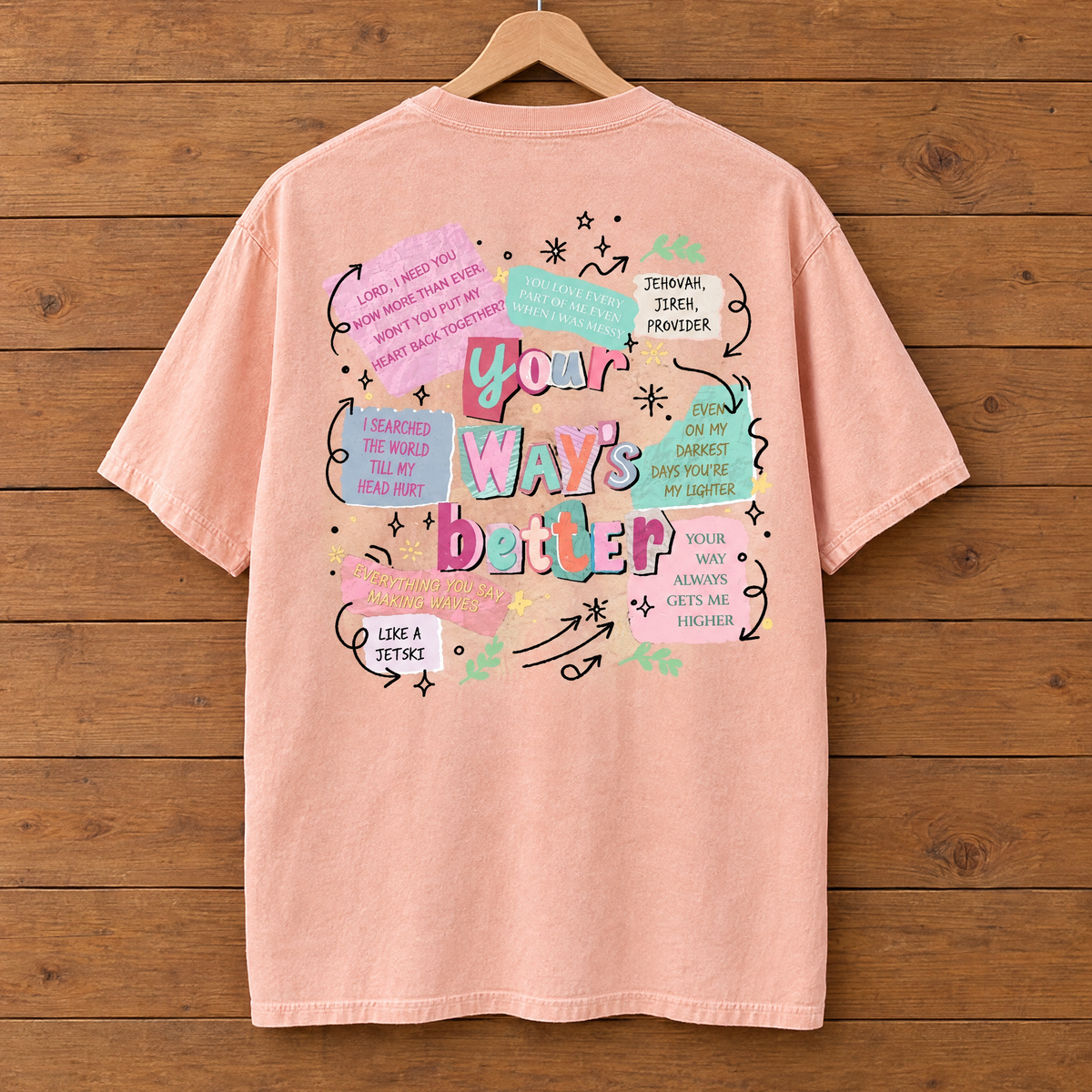Back collage print of the Your Way's Better Comfort Colors shirt in Peachy on a hanger